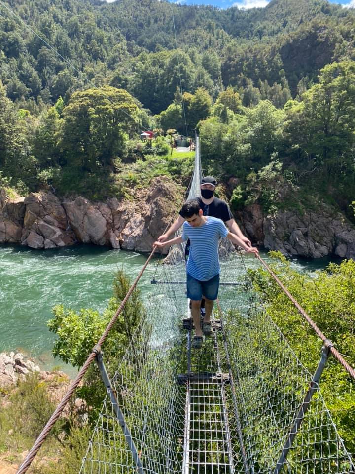 Nik crossing a swing bridge Nik crossing a swing bridge