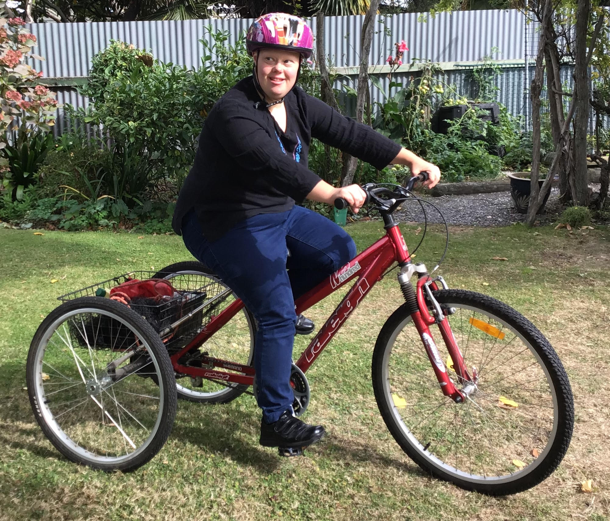 Deena on her red bike 