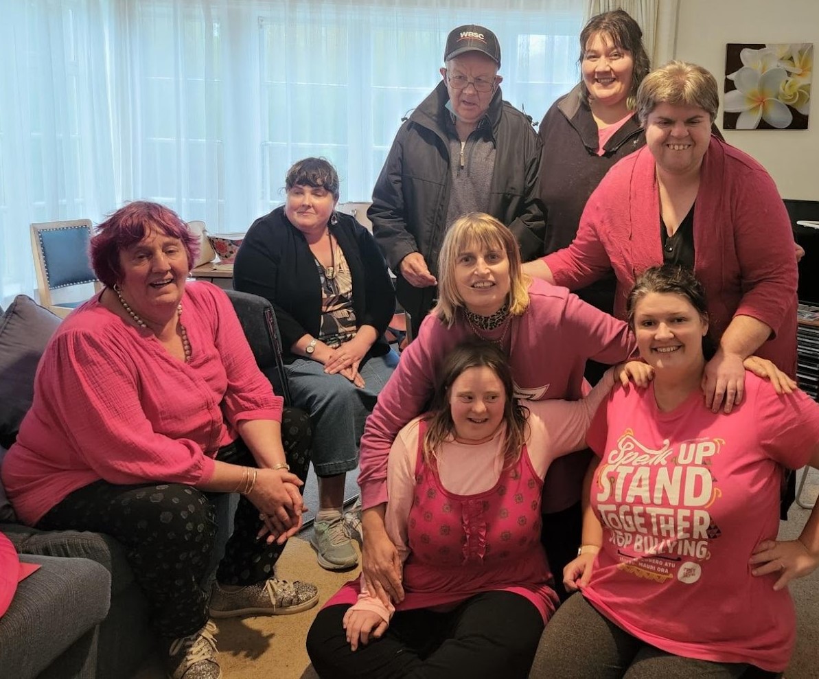 Tui Network Pink Shirt Day Network group wearing pink shirts for fundraising