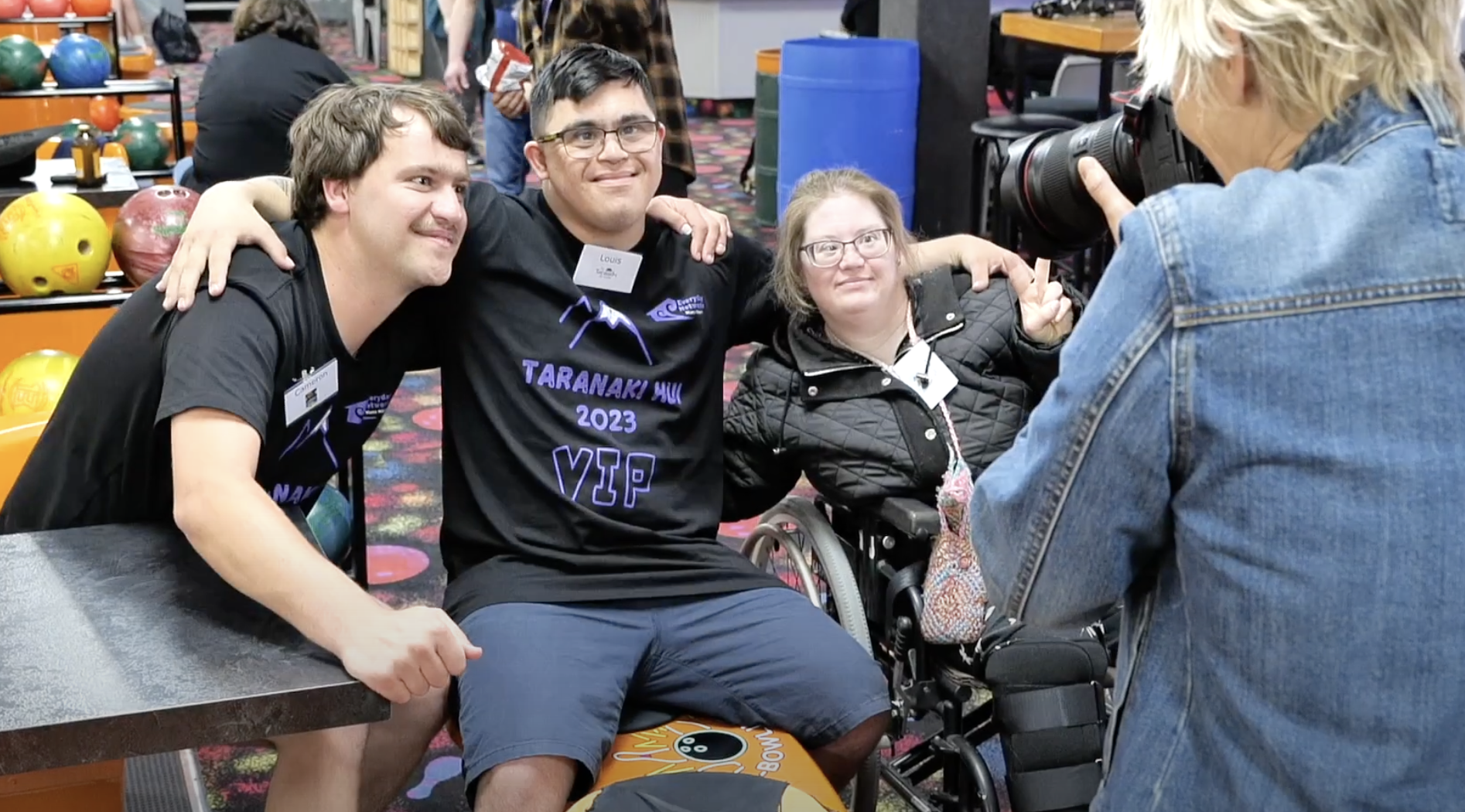 Dom giving the thumbs up in front of his network group